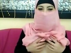 Beautiful arab girl in hijab masturbates