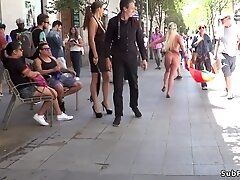 Huge tits painted blonde caned in public