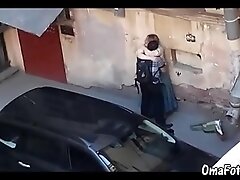 Chubby mature fucks with a man in the parking lot, public sex