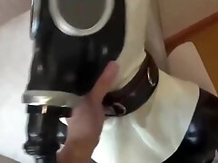 Intense breathplay in latex catsuit and gasmask