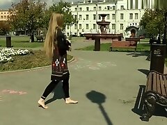 Russian beauty shows off her feet in public
