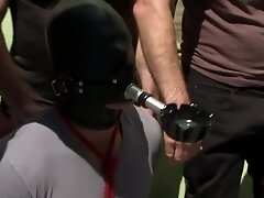 Muscled whore gets publicly fucked and doused with cum